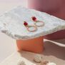 Red gem circle stud earrings